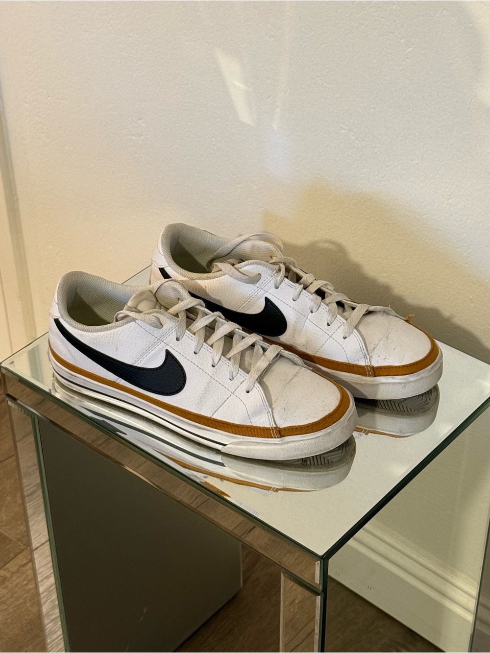 Nike Women’s White Low-Top Sneakers with Black Swoosh and Brown Trim